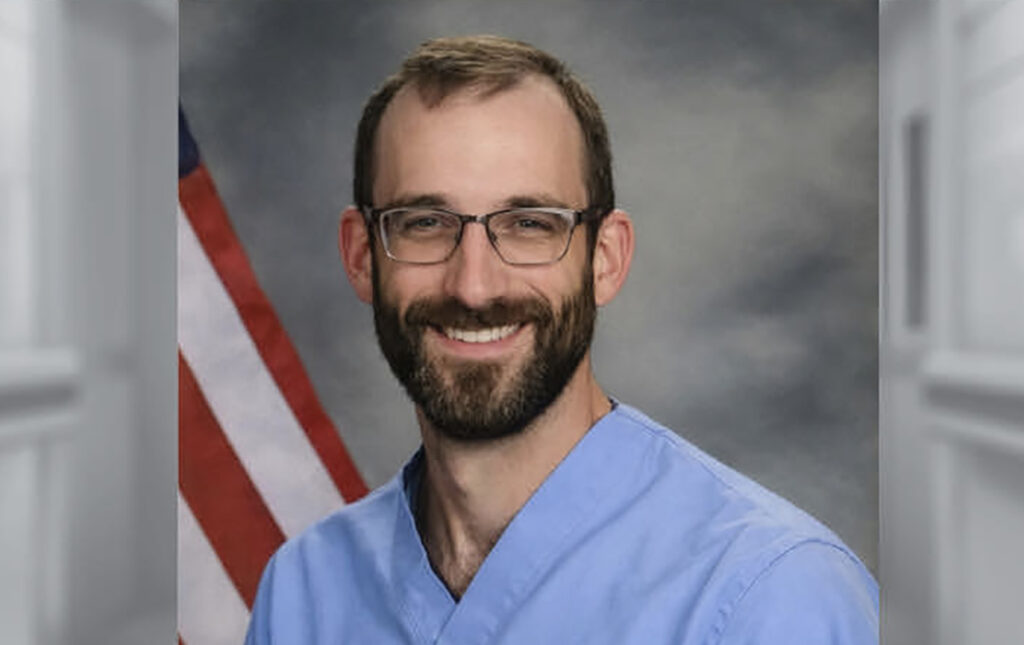 Alex Pretti's official portrait in 2024, as a registered nurse for the United States Department of Veterans Affairs. (Credit: Wikimedia)