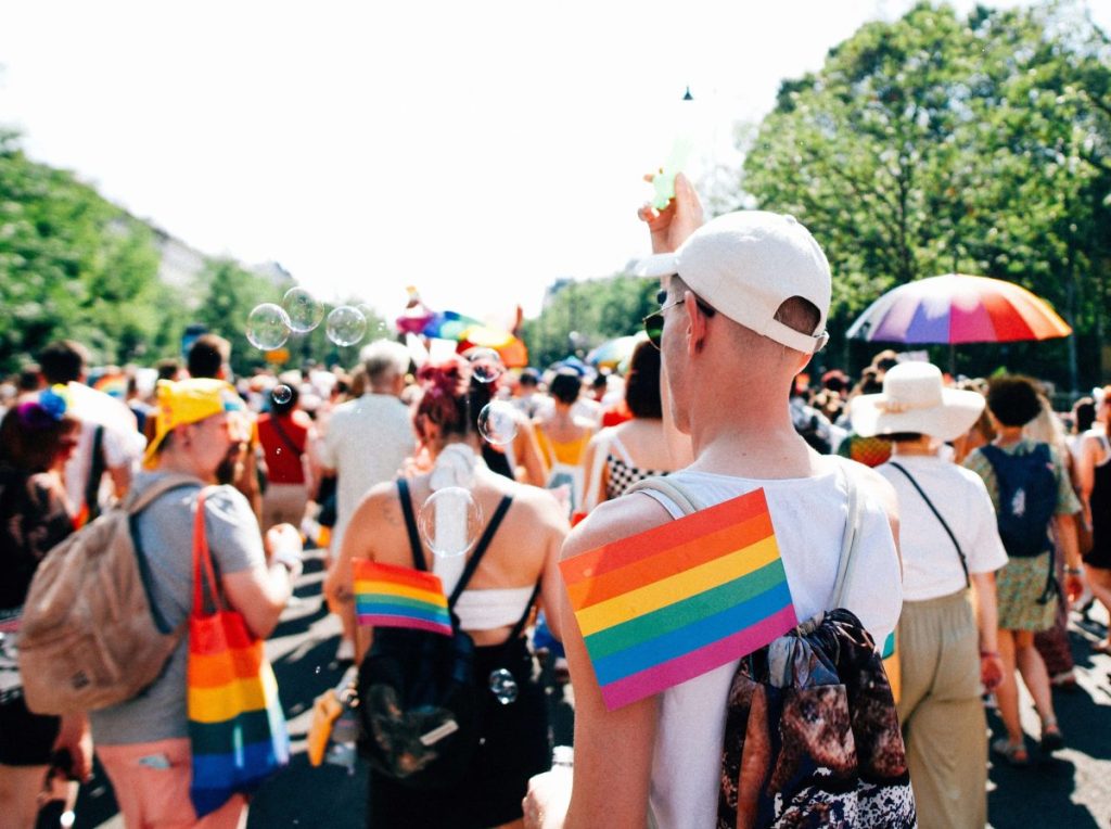 The Trevor Project runs an independent hotline that reaches about 250,000 LGBTQ+ young people each year. (Credit: Christian Lue on Unsplash)  
      